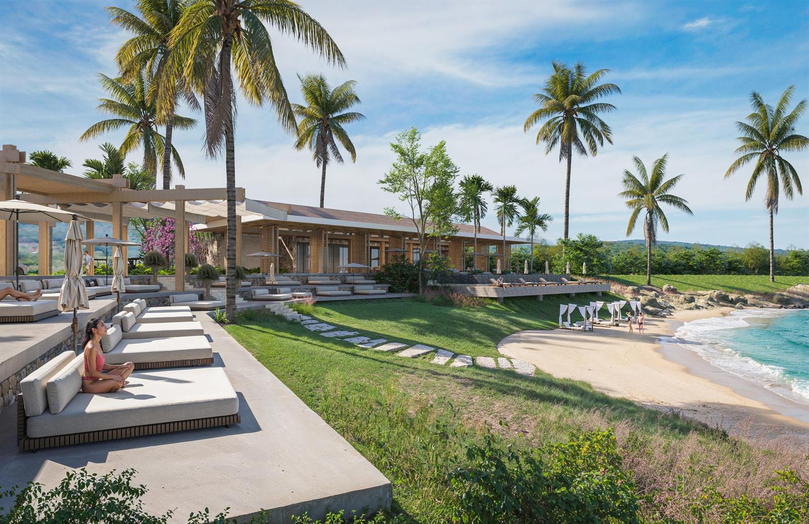 Asoleaderos del Beach Club con vista a la playa y al mar